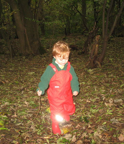 Clara M in Ocean dungarees and boots, with Playshoes bootsocks