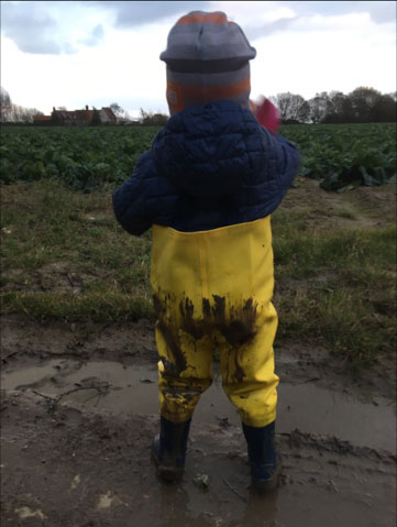 Archie age 2, loves his waders, loves mud!