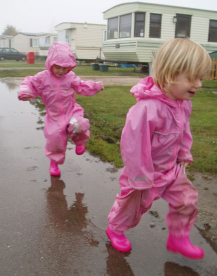 Bryony and Louisa having fun caravanning - despite the weather!