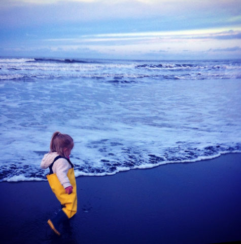 Darcie on the beach in waders