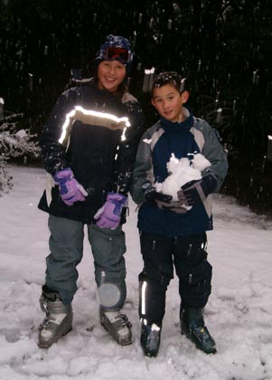Elisha and Dominic enjoying the New Zealand Snow in Dare2Be jacket & salopettes