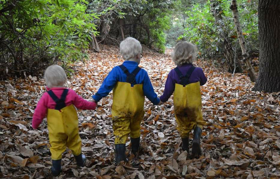 Green family having fun in their waders