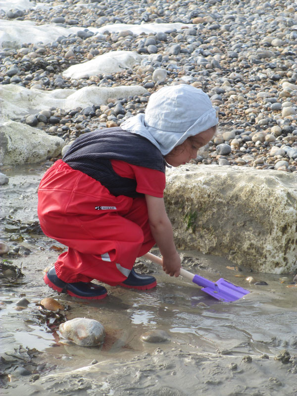 Jacob having fun in his waterproof Ocean Rainwear trousers