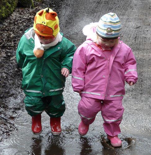 Jasper and Sren enjoying puddle jumping