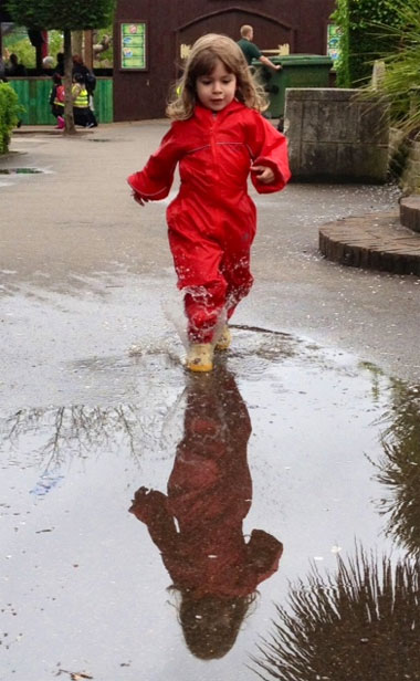 Olivia Louise enjoying puddles