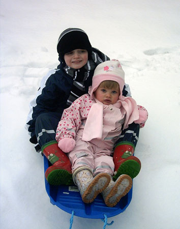 Robert and Joanna - waterproof in Kiba print suit and Kiba dungarees