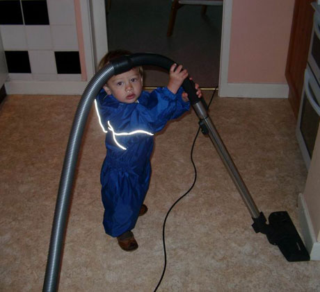 Sam 'helping' with the cleaning in his Regatta Puddle Suit