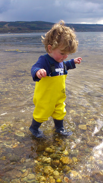 Scott paddling in his waders