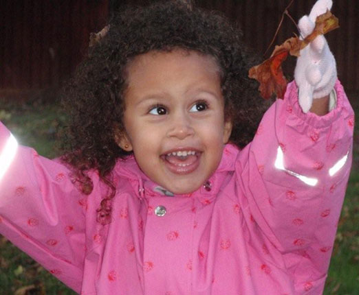 Playing outside with leaves